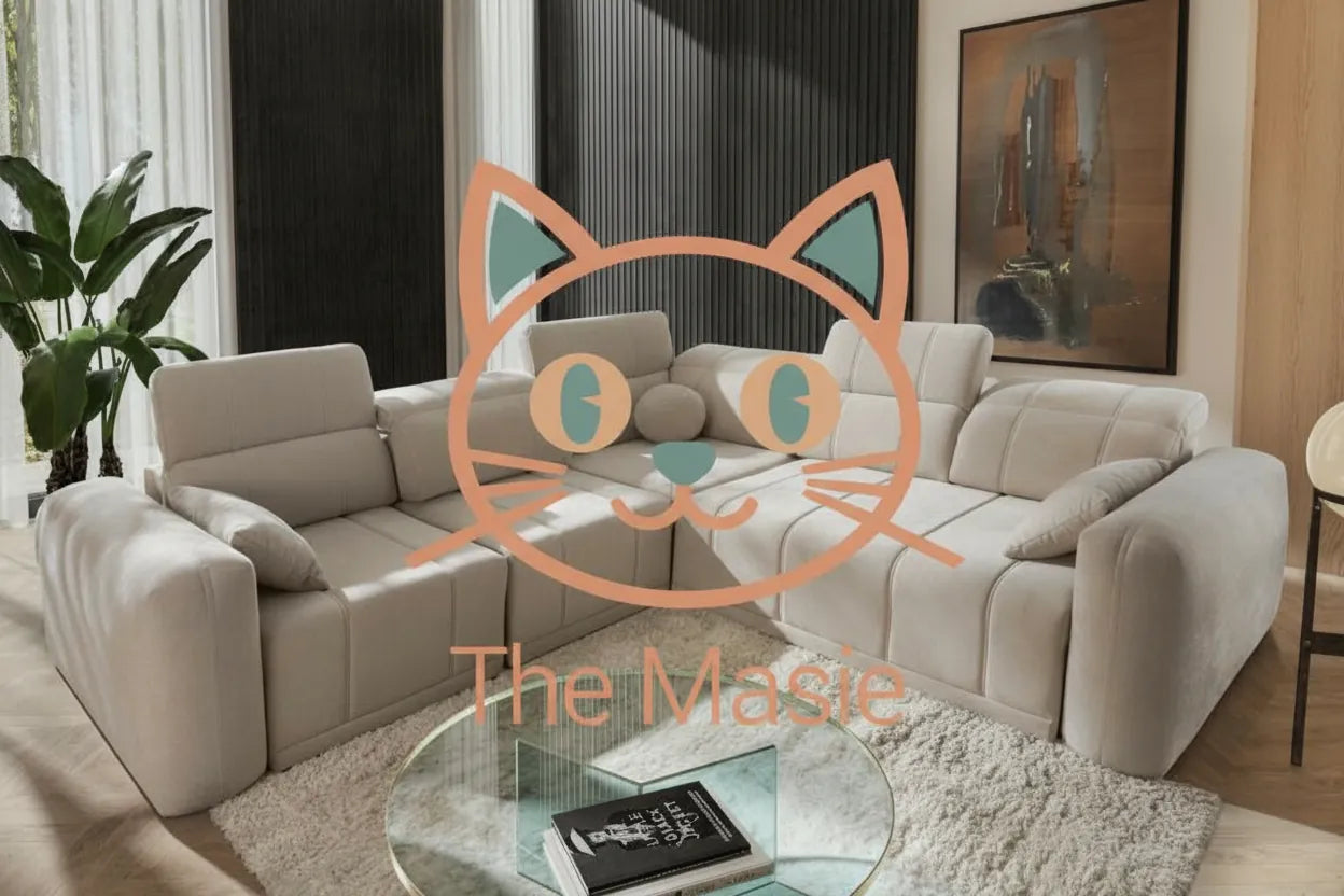 Realistic photo of a modern gray sofa with a superimposed minimalist graphic design resembling a friendly cat face centered on the cushions.