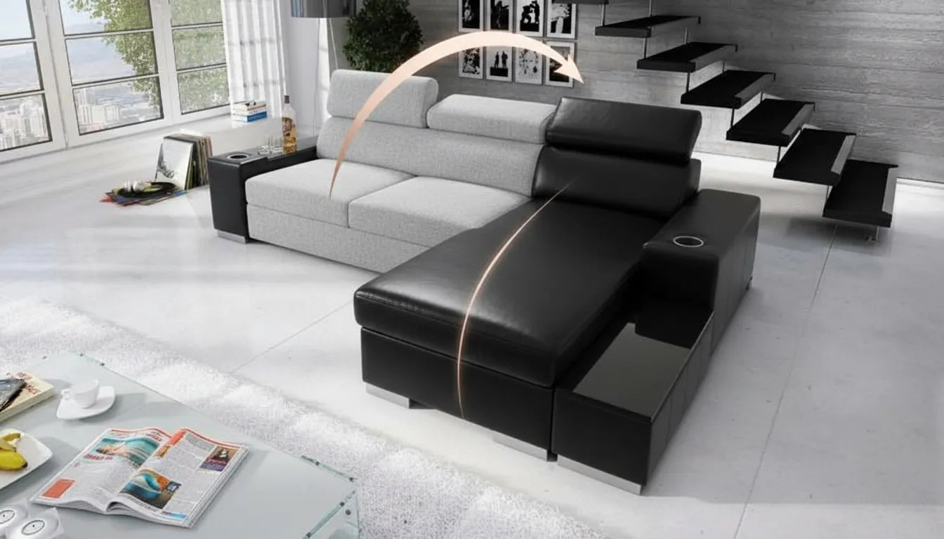 Canapé moderne partage moitié tissu gris clair et moitié cuir noir brillant avec flèche or rose symbolisant le centre