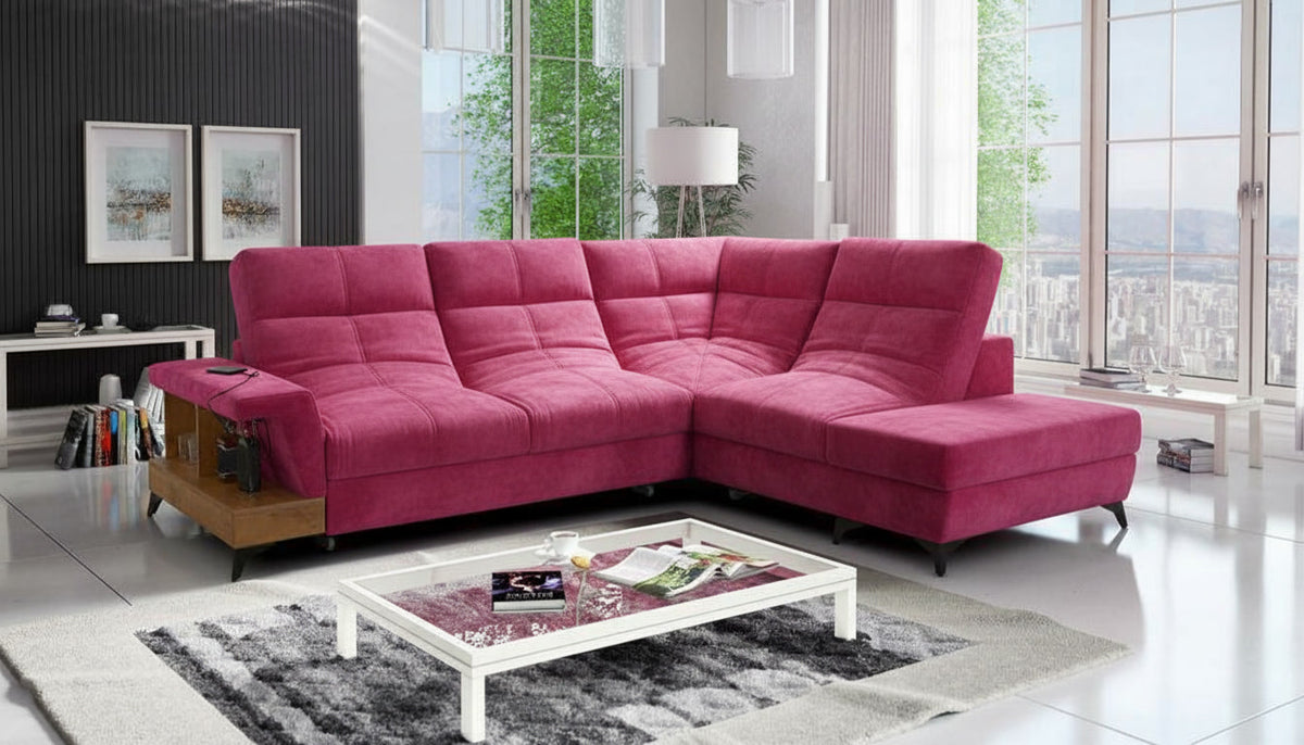 Image d'un canapé de trois places de couleur rose.