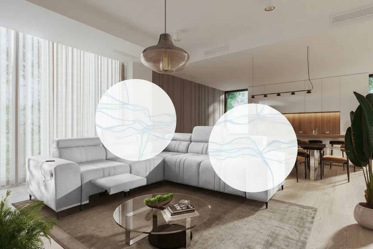 Canapé d'angle IKEA gris clair dans salon lumineux avec motif graphique abstrait subtil sur le coin