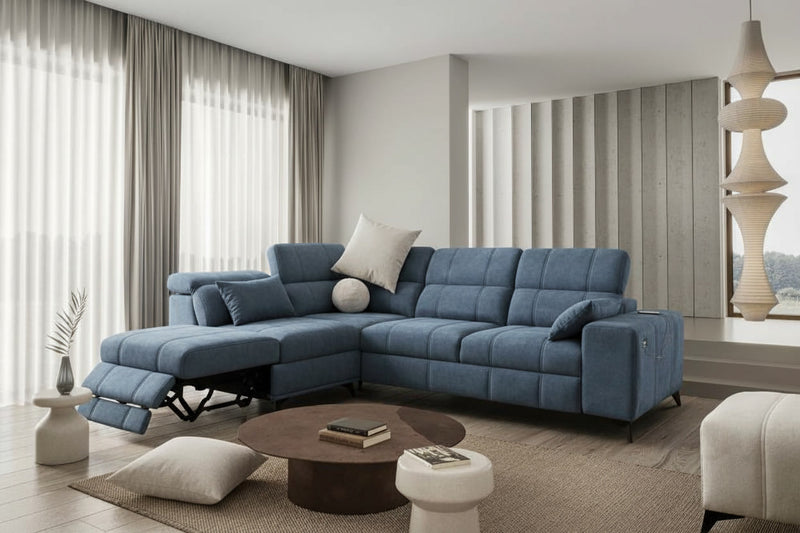 Image d'un canapé convertible de couleur bleue.