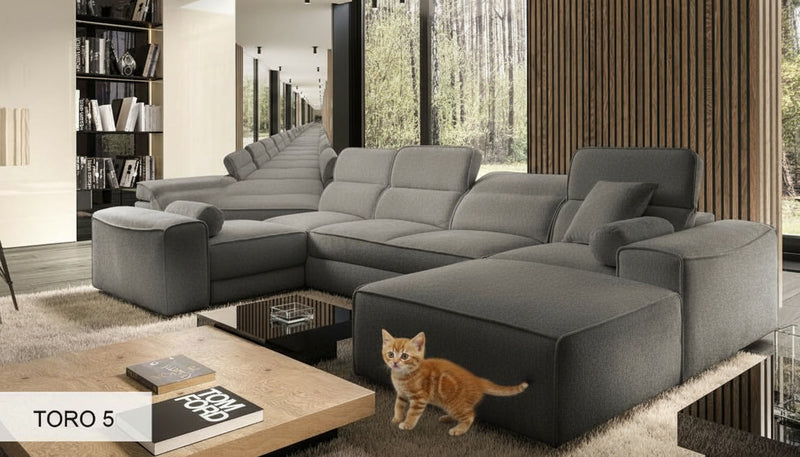 Image d'un canapé de type panoramique de couleur grise.