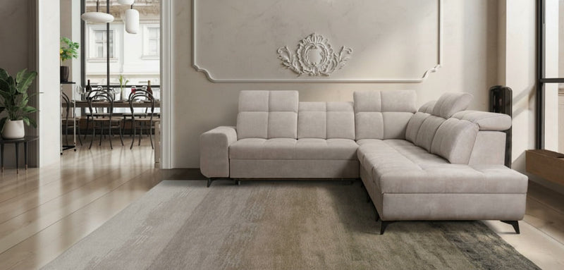 Image d'un canapé reposant sur des pieds hauts.