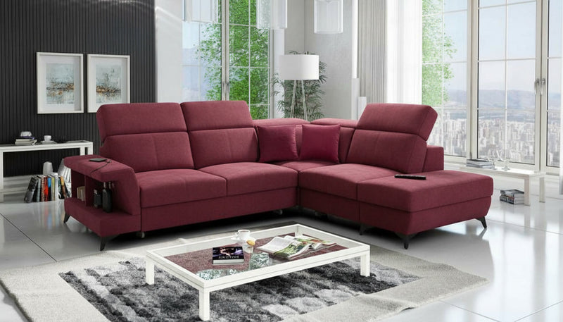 Image d'un canapé convertible de couleur rouge.