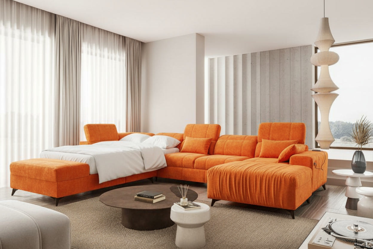 Image d'un canapé convertible de couleur orange.