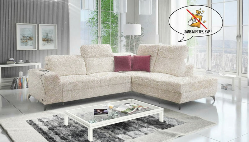 Photographie représentant un canapé entièrement recouvert de tissu.