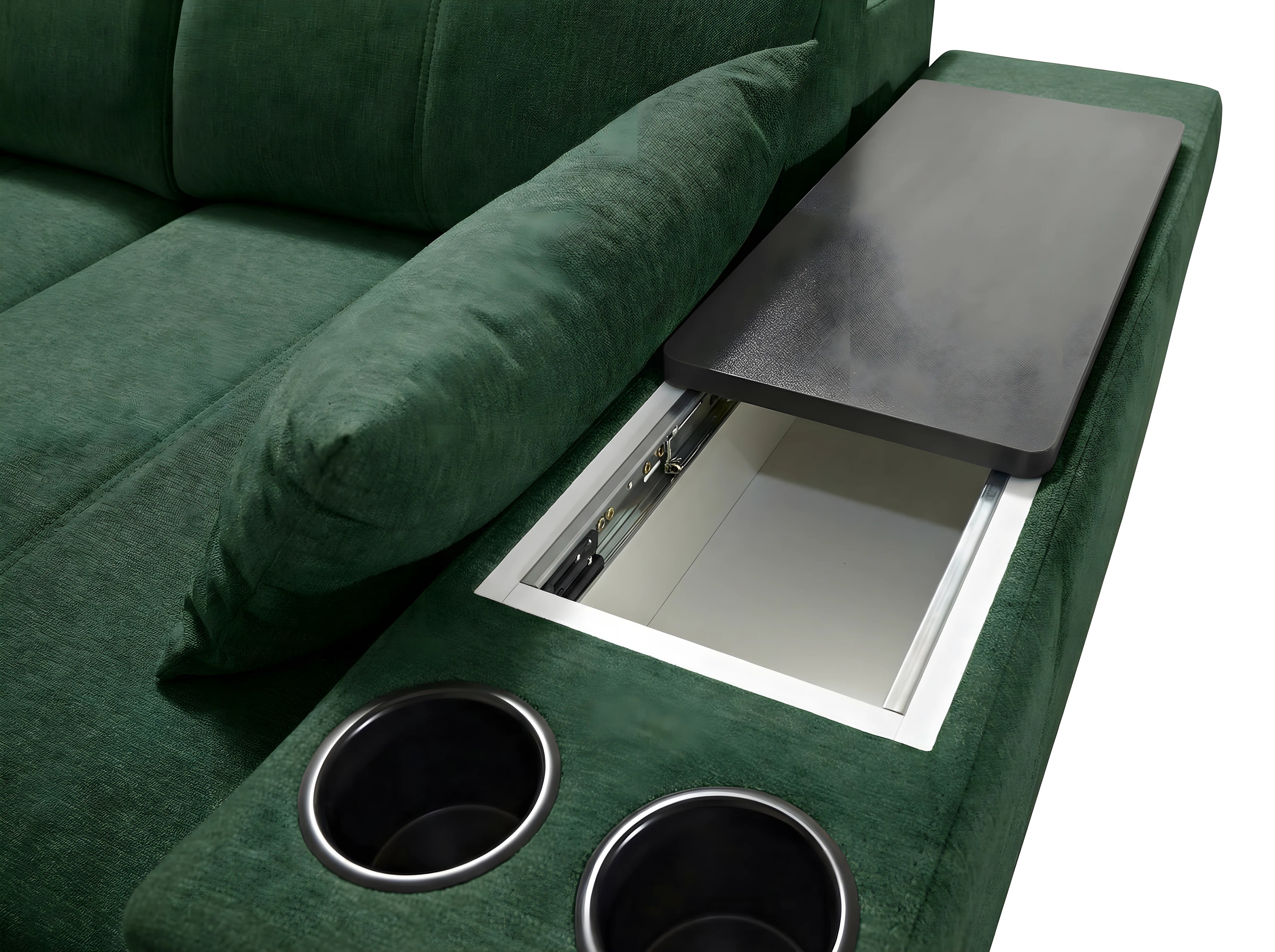 Canapé d'angle vert en tissu avec accoudoir, tablette noire relevable, porte-gobelets argentés, détail d'intérieur